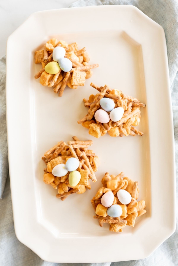 No bake birds nest cookies on a white platter.