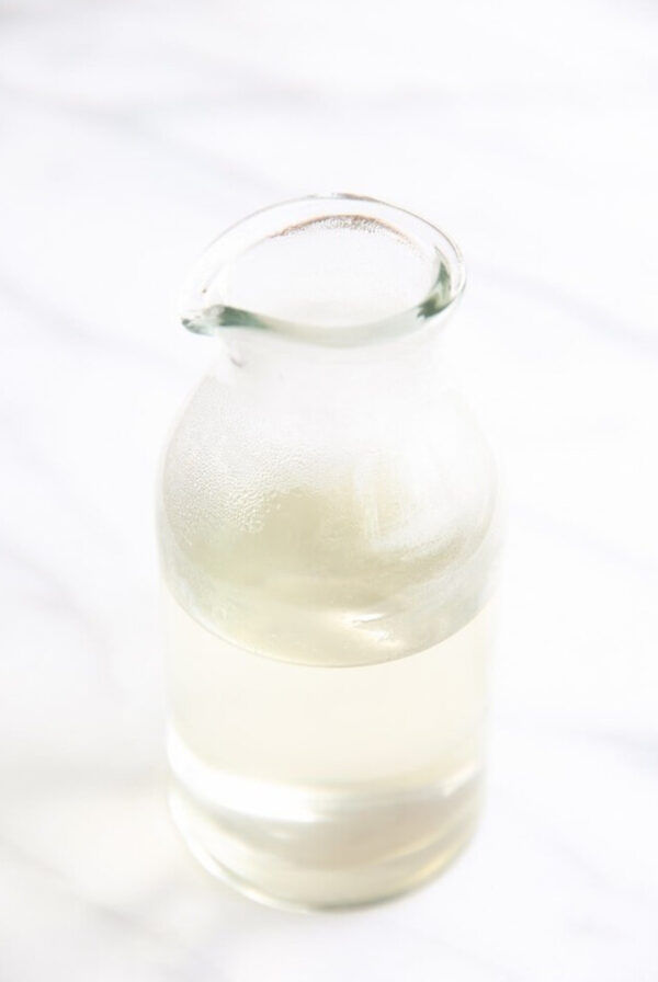 A glass jar full of simple syrup